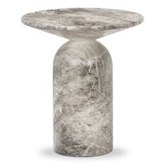 a marble table with a round base on the top, and a circular pedestal in the middle