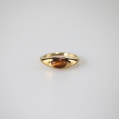 Modern Amber Oval Ring, Gold Gemstone Midi Ring For Promise, Gold Crystal Ring With Polished Finish For Formal Occasions, Classic 14k Gold Amber Jewelry, Classic Tarnish Resistant Crystal Ring Gift, Classic Crystal Ring As Gift, Formal Amber Open Ring Jewelry, Classic Tarnish-resistant Crystal Ring For Gift, Gold Signet Ring With Gemstone For Promise