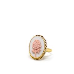 Elegant and playful, this White Rose cameo ring by Vintouch is hand-cast from 18-karat gold-plated silver in the designer's workshop in Naples, Italy. It's centered with brilliant hand-carved from porcelain flower cameo, symbolizing true love and rebirth. Cast from 18 karat gold over Sterling Silver. (1 micron thickness). To protect gold-plating from natural oxidation, a 0. 10 micron palladium plate is applied before the gold-plating process. Palladium is an anti-oxidizing precious metal.  Entir 14k Gold Rose Design Ring, 14k Gold Rings With Rose Design For Gift, Yellow Gold Rings With Rose Design For Gift, Cameo Jewelry, Naples Italy, Cameo Ring, Italian Jewelry, Porcelain Flowers, Hand Cast