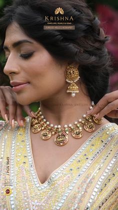 💫Shine on your special day with our [22K Gold] [Bridal Set], featuring Ganesh [jhumkas], [bottu mala], and matching [bangles] and [rings]💍. Embellished with [diamonds]💎, [rubies], [emeralds], and [pearls].🪷
.
► Call/ WhatsApp/ Video Call: 📲+91-8499011111
.
#krishnajewellerspearlsandgems #krishnajewellers #bottumala #bottumalanecklace #goldnecklace #necklace #necklacesets #jhumkaearrings #jhumkas #earrings #earringstyle #bangles #goldbangles #goldbangleset #traditionaljewelry #indianjewelry Bottu Mala, Gold Bridal Set, Gold Earrings Models, Gold Bangle Set