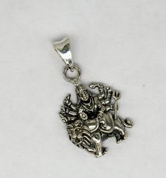 Indian Hindu Idols Blessing Goddess Bhawani/Durga/Santoshi maa with lion vintage antique style stunning divine pendant, best gifting unisex jewelry from India. Metal-925 sterling silver. Item type-Pendant Weight-5.020 grams. Height-3.7 centimeter. Width-2.0 centimeters. Stamped-925. Finish-Oxidized. note:chain is not included in this price Make excellent gifting and collectible pieces(gifts for birthdays, weddings, anniversaries, mother's day, fathers day, Christmas day,) We take absolute care o Symbolic Jewelry For Puja And Navratri, Symbolic Jewelry For Navratri Puja, Spiritual Silver Dangle Jewelry, Traditional Locket Jewelry For Navratri, Hallmarked Jewelry For Puja And Navratri, Hallmarked Round Pendant For Puja, Silver Spiritual Necklaces For Navratri, Silver Amulet Collectible Jewelry, Spiritual Oxidized Jewelry For Navratri