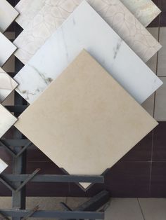 several different types of tile on display in a room