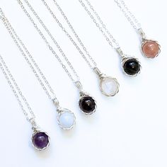 This elegant twist wire wrapped crystal necklace, available in sterling silver and 14k gold filled, features obsidian, moonstone, amethyst, aquamarine, garnet, and strawberry quartz.  💐𝐃𝐄𝐓𝐀𝐈𝐋 * Handmade item * Gemstones: Amethyst, Aquamarine, Garnet, Moonstone, Gold Sheen Obsidian, Strawberry Quartz, all 8mm round * Sterling Silver: 1.3mm Flat Cable, available in 16",  18" or 20" length  * 14K Gold Filled: 1.3mm Flat Cable, available in 16", 18" or 20" length 💎𝑨𝒎𝒆𝒕𝒉𝒚𝒔𝒕 - It is kn Moonstone Gemstone Beads Crystal Necklace As Gift, Silver Wire Wrapped Crystal Necklaces, Adjustable Sterling Silver Crystal Necklace With Gemstone Beads, Wire Wrapped Crystal Necklace With Round Pendant For Gift, Sterling Silver Crystal Necklace With Gemstone Beads Gift, Spiral Wire Wrapped Sterling Silver Necklace, Spiritual Gemstone Jewelry With Silver Plated Wire, Silver Birthstone Crystal Necklace, Sterling Silver Crystal Necklaces With Gemstone Beads