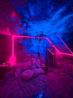 a bedroom with pink and blue lights on the ceiling, stars in the sky above