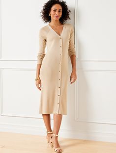 The easiest and prettiest sweater dress you'll own this season. Crafted from sublimely soft ribbed fabric with easy button front closures. A polished work-to-weekend style. Features Sheath Dress V-Neck Long Sleeve Snap closure Hits Below Knee Imported Fit: Misses: 41 1/2"; Petite: 39"; Plus: 41 1/2"; Plus Petite: 39" Material: 57% Viscose, 18% Polyester, 13% Nylon, 8% Metallic, 4% Spandex Care: Machine Wash Cold; Only Non-Chlorine Bleach When Needed; Reshape, Lay Flat To Dry; Warm Iron, If Needed | Button Front Ribbed Sweater Dress Talbots Button Down Sweater Dress, Tan Sweater Dress, Sweater Dress Short, Pretty Sweaters, Dress With Buttons, Ribbed Sweater Dress, Tan Sweater, Classic Style Women, Dress Short Sleeve