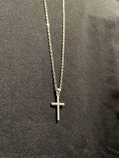 The Serene Cross is a stunning piece that captures the essence of tranquility and divine grace. Crafted by Christians, this cross pendant exudes an elegant simplicity that makes it a timeless accessory. The clean lines and smooth finish give the Serene Cross a sophisticated, minimalist aesthetic, perfect for everyday wear or special occasions. Minimalist Clavicle Chain Crucifix Jewelry, Minimalist Crucifix Clavicle Chain Jewelry, Everyday Minimalist Cross Pendant Necklace, Minimalist Everyday Cross Necklace, Minimalist Daily Wear Cross Pendant Necklace, Minimalist Cross Pendant Necklace With Clavicle Chain, Minimalist Clavicle Cross Chain Jewelry, Minimalist Cross Pendant Necklace As Gift, Everyday Silver Cross Pendant Necklace