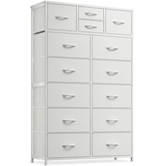 a large white cabinet with many drawers