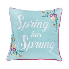 a blue pillow that says spring has sprung