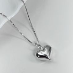 "High Polish Sterling Silver Puffed Heart Pendant on Sterling Silver Box Necklace Chain Please see second photo for size reference Necklace Size:  Please see sizing guide and select preference from drop down list Comes beautifully gift packaged, ready to gift. If you want the item gift packaged with a message card, please type your message in the \"add your personalization\" box or in the \"add a note to elleaccents\" box at the cart page. Shipping Policies: Please see FAQs below" Silver Heart Charm Necklace For Birthday Gift, Silver Heart Charm Necklace For Birthday, Heart Shaped Pendant Necklace For Valentine's Day Birthday, Cute Heart Necklace For Valentine's Day, Silver Heart Necklace For Birthday, Cute Silver Heart Necklace With Charm, Cute Valentine's Day Heart Pendant Necklace, Heart Charm Necklace For Valentine's Birthday Gift, Heart Charm Necklaces For Birthday Gift