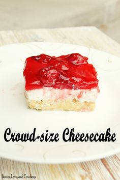 a close up of a piece of cake on a plate with the words crowd - size cheesecake