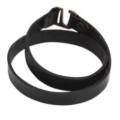 Sleek black leather becomes a men's wrap bracelet of powerful elegance. Chaloemphon adds an antiqued brass hook to his trendy new design. Classic Black Bracelets With Wrist Strap, Classic Black Bracelet With Wrist Strap, Classic Adjustable Leather Bracelet With Waxed Finish, Classic Adjustable Leather Bracelet With Wrist Strap, Vintage Black Bracelet With Leather Strap, Vintage Black Leather Bracelet, Brass Hook, Wrap Bracelets, Leather Wrap Bracelet