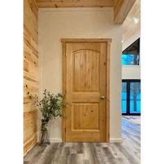 Rustic Knotty Alder Arch Top V-Groove Interior Door - Krosswood Stained Wood Interior Doors, Wood Door With White Trim, Stained Doors White Trim, Stained Interior Doors, European Cottage Interiors, Interior Doors Styles, Knotty Pine Doors, Knotty Alder Doors, Pine Interior Doors