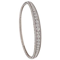 Check out this item from 1stdibs! Marcus & Co. 1910 Edwardian Bangle Bracelet In Platinum With 3.16 Ctw In Diamond: https://www.1stdibs.com/id-j_22599242 Edwardian Bracelet, Iconic Jewelry, Simple Wedding Bands, Edwardian Ring, Edwardian Jewelry, Filigree Pattern, Elegant Bracelet, Natural Earth, Jewelry Maker