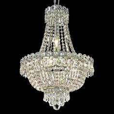 a crystal chandelier hanging from the ceiling