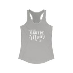 A high-quality print of this slim fit tank-top will turn heads. Bystanders won't be disappointed - the racerback cut looks good on any woman's shoulders. .: Material: 60% combed ring-spun cotton, 40% polyester .: Extra light fabric (3.9 oz/yd² (132 g/m .: Slim fit .: Tear-away label .: Runs smaller than usual Cotton Graphic Print Racerback Tank Top, Summer Racerback Tank Top With Letter Print, Cotton Scoop Neck Tank Top For Sports, Fitted Racerback Tank Top With Graphic Print, Swim Mom, Workout Tank Tops, Racerback Tank, Mom Life, Light Fabric