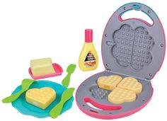 a toy waffle maker and other kitchen items