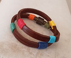 "B R A C E L E T ∙ D E T A I L S - Custom leather bracelet - Hand made - Hook type clasp H O W ∙ T O ∙ O R D E R -Add item to shopping cart -Then add personalization to the \"notes\" section during checkout. ORDERING THIS BRACELET AS A GIFT? -The average women's wrist size is 6.5 inches. -The average men wrist size is 7.5 inches. W R I S T ∙ S I Z E :(please view the photo showing how to take your wrist size) -Please measure your wrist carefully and choose your actual wrist size. -Please do not add extra room when measuring! -Wrist size is wrist measurement. Not bracelet size. -We'll add just the right amount of additional length to make it fit. C A R E ∙ F O R ∙ Y O U R ∙ J E W E L R Y -Keep dry. -Remove when going to shower, sleep, pool, beach or spa -Never use chemical jewelry cleaners Brown Leather Wrap Bracelet As Gift, Brown Leather Wrap Bracelet Gift, Brown Leather Wrap Bracelet For Gift, Brown Leather Strap Wrap Bracelet Gift, Casual Multicolor Leather Bracelet As Gift, Casual Multicolor Leather Bracelet As A Gift, Casual Multicolor Leather Bracelet For Gift, Handmade Brown Leather Friendship Bracelet, Brown Waxed Cord Bracelets For Gift