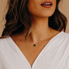 Our dainty Emerald Green Necklace is part of our new Birthstone Necklace Collection! This beautiful, yet delicate necklace is made with a beautiful emerald green stone which represents the birth month for May. May's birthstone is known for rebirth + love. This stone is emerald cut and faceted to ensure it sparkles from every angle. This beauty is perfect to gift to someone special, or treat yourself! It deserves to be worn every day. ----------------------FEATURES◊ Emerald green stone (dyed emer Mama Jewelry, Christmas Help, Emerald Green Necklace, Emerald Green Stone, Green Stone Necklace, Necklace Emerald, Necklace Birthstone, Necklace Collection, Etsy Bridesmaid Gifts