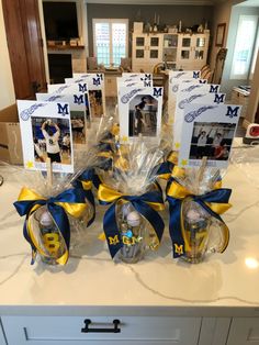 the sports themed baskets are sitting on the kitchen counter