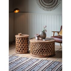 two wooden tables sitting on top of a hard wood floor