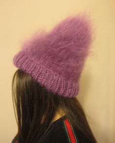 HAND KNITTED HAD / HEAD WARMERS ### DESIGNED & CREATED by Giorgio Qualitat ### Product Specification: §  Color:        Rose; §  Style:         Ribbed hand knitted hat; §  Material:    2 strands premium class long hair mohair; §  Net weight: 92 g Giorgio Qualitat is offering you an exceptional quality hand knitted hat.  A hand-knitted hat is a pleasure to own and will always outlive its commercially produced poor relation. Buy them for yourself or as a unique gift for a treasured friend. Knitted Winter Knitted Mohair Hat, Winter Mohair Knitted Hat, Lilac Winter Hat, Head Warmers, Hand-knitted One Size Purple Hat, Purple Beanie Hat, One Size, Hats Beanie, Hats Women, Rose Hat