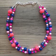 "💞One of a kind & ready to ship💞 A great statement piece! Two of layers of SERIOUSLY gorgeous beads, hand dyed with blue and pink tones. This also features glass crystals, acrylic marble beads, and blue & pink glitter mirror balls. 16\" long with a 4\" extender chain. Need MORE necklaces? Send me a message :) *Smoke and pet free home!* I ship 6 days a week! Thank you for browsing my store! Like this style but prefer another color? Check out our other BIG BEAD necklaces: https://www.ets Playful Pink Necklaces For Party, Playful Pink Necklace For Party, Pink Playful Party Necklaces, Playful Pink Party Necklaces, Playful Blue Adjustable Beaded Necklace, Playful Adjustable Blue Beaded Necklace, Cute Blue Necklace For Birthday, Playful Blue Beaded Necklaces For Gifts, Playful Blue Jewelry For Party