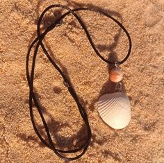 This cute, handmade necklace was made using a hand picked shell, from one of the most beautiful beaches in Algarve, Praia de Faro. It brings beach vibes anywhere you go, while also making you feel  The shell has a slight sea breeze scent, as it was washed using saltwater from the Atlantic Ocean. Fun fact: This product has a small carbon footprint, as it was caught by hand, and delivered using a low carbon emission mail service. Adjustable Summer Necklaces As Gifts, Adjustable Summer Necklaces For Gifts, Adjustable Summer Style Necklaces As Gifts, Adjustable Summer Style Necklace As Gift, Handmade Summer Necklace For Gift, Handmade Summer Strand Necklace, Handmade Strand Necklaces For Summer, Handmade Adjustable Shell Necklace, Handmade Shell Necklace In Ocean-inspired Style