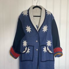 a blue jacket with white stars on it