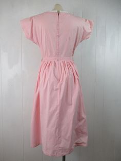 Cotton Lined Midi Dress For Garden Party, Pink Cotton Midi Dress For Daywear, Pink Cotton A-line Dress, Lined Knee-length Vintage Cotton Dress, Pink Fitted Waist Summer Dress, Cotton Vintage Midi Dress For Garden Party, Knee-length Cotton Vintage Dress, 1950s Cotton Vintage Dress For Daywear, Vintage Cotton Midi Dress For Summer