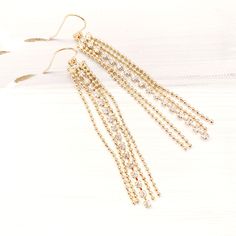 Gold Tassel earrings, Cubic Tassel earrings, Long Chain Tassel earrings, Chain gold earrings Elegant Gold Crystal Earrings With Dangling Beads, Gold Dangle Tassel Earrings For Wedding, Gold Tassel Earrings For Party, Gold Earrings With Dangling Charms For Party, Gold Crystal Earrings With Dangling Beads For Parties, Elegant Tassel Earrings With Dangling Charms For Party, Gold Tassel Jewelry For Evening, Festive Tassel Drop Earrings, Elegant Gold Tassel Earrings As Gift