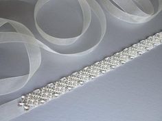 Bridal belt sash Bridal Swarovski crystal belt sash Wedding image 6 Elegant White Sashes With Rhinestones, Elegant Silver Belt With Rhinestones, Elegant Evening Belts With Rhinestones, Elegant Jewelry With Ribbon For Wedding, Elegant Wedding Jewelry With Ribbon, Elegant White Belt With Rhinestones, Silver Rhinestone Sash For Formal Occasions, Silver Bridal Accessories With Sashes For Party, Elegant Ribbon Bridal Belt For Wedding