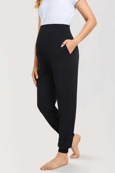 Casual Stretchy Maternity Joggers _ Black Comfort Waistband Yoga Pants For Lounging, Soft Sleep Bottoms, Comfortable Solid Harem Pants For Loungewear, Comfortable Loose Fit Yoga Pants For Lounging, Full-length 4-way Stretch Sweatpants For Loungewear, 4-way Stretch Full-length Sweatpants For Loungewear, Long Yoga Pants For Relaxation, Comfortable Full-length Yoga Pants For Loungewear, Loosely Fitted Full Length Yoga Pants For Loungewear