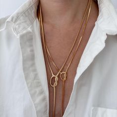 Gold Filled Knotted Lariat Necklace | Herringbone Snake Chain Y Necklace | Gold Mini Cube Chain Link Layering Necklace | Long Drop Necklace Super chic and minimal that goes well with all outfits. Adjustable, you have a choice of clasping it at 20" or 22" Lariat necklace with 3" drop in the center. Check out more styles: https://jordanskyjewelry.etsy.com Handmade and designed in NY. ------------------------------- M A T E R I A L S  18K gold filled  Thanks for supporting our small business❤︎ ---- Gold Lariat Necklace Simple, Luxury Lariat Toggle Necklace With Chain, Trendy Lariat Chain Necklace, Everyday Metal Lariat Necklaces, Chic Chain Lariat Necklace For Gift, Adjustable Lariat Long Necklace With Chain, Chic Lariat Chain Necklace For Gift, Adjustable Length Metal Lariat Chain Necklace, Chic Gift Lariat Necklace With Chain