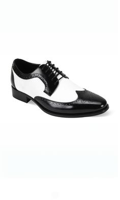 Meet “Moscow” by Giorgio Venturi – Black & White Dress Shoes that embody elegance and quality. These shoes, bearing the esteemed Giorgio Venturi name, are the epitome of timeless sophistication. With their sleek two tone design, they effortlessly elevate your formal or professional look. Not only stylish, but “Moscow” also prioritizes comfort for all-day wear. ... Read more Formal White Pointed Toe Oxfords, White Pointed Toe Oxfords For Formal Occasions, Luxury Formal Oxfords With Brogue Detailing, Elegant Wingtip Dress Shoes With Rubber Heel Cap, Fitted Wingtip Oxfords For Wedding, Formal White Pointed Toe Dress Shoes, White Pointed Toe Oxfords For Party, White Pointed Toe Dress Shoes For Formal Occasions, Classic Fitted White Wedding Shoes