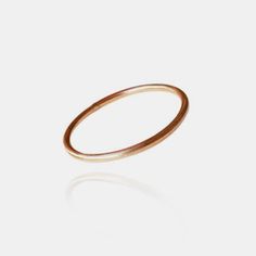 A subtle and versatile minimalist piece, this delicate lightweight thread ring is perfect for stacking or on its own as a dainty accent. Materials: 18k solid goldSize: 6 & 7 Additional Details:For this ring in a different size, please email us at info@shopthemansion.com and we can see about a special order or potential resize. Caroline Hjerpe is a small dedicated team based in Sweden, designing and making handmade jewelry since 2014. Gold Bracelet, Ring Size, Handmade Jewelry, Gold