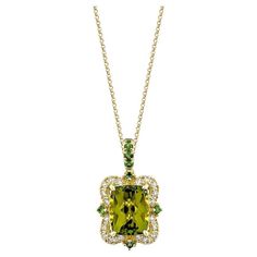 This collection features a selection of the most Olivia hue peridot gemstone. Uniquely designed this pendant with tsavorite and diamonds in Yellow gold to present a rich and regal look. Peridot Pendant in 18Karat Yellow Gold with Tsavorite and Diamond. Peridot: 3.86 carat, 10X8mm size, cushion shape. Tsavorite: 0.08 carat, 1.60mm size, round shape. Tsavorite: 0.08 carat, 1.60mm size, round shape. White Diamond: 0.26 carat, 1.50mm size, round shape, G color, VS clarity. Gold: 3.251g, 18Karat Yell Luxury Gold Tsavorite Necklaces, Luxury Yellow Gold Tsavorite Jewelry, Luxury Tsavorite Gemstone Necklace, Luxury Tsavorite Pendant Jewelry, Emerald-cut Tsavorite Fine Jewelry, Peridot Pendant, Peridot Gemstone, White Diamond, Jewelry Necklace Pendant