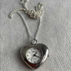 There’s No Further Discount Unless You Bundle 2 Or More Purchased This Around 2000-2001 Never Used American Eagle Outfitters Silver Tone Heart Watch Necklace ..The Battery Has Been Changed (Cost Me $8) And New And It Works It’s A Sweet Little Heart Pendant Watch Necklace Pendant Watch Measures Approximately 1.2” High By 1” ..Chain Is 24” Long .. 12” Drop! Very Charming Dream Jewelry Silver, Clock Locket, Dark Sketches, Clock Necklace, Whimsical Necklace, Heart Necklace Silver, Heart Watch, Pendant Watch, Simple Watches