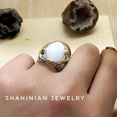 Handmade silver and gold plated ring with natural white stone agate. This is a perfect gift idea for mother, sister, and fish, sea animal lover) All our jewelry is made of high-quality sterling silver and has a stamp of 925 ▶RING SIZE: any size available (choose from the option) ▶RING WEIGHT: 11.2 gr ▶EARRINGS WEIGHT: 19.9 gr ▶EARRINGS LENGTH: 59 mm 1 inch = 25.4 mm 1 pound = 453.6 grams ⦿ Attention: The color of the stones may differ due to a difference between monitors ◦* ◦* ◦* ◦* ◦* ◦* ◦* ◦* Fine Jewelry White Cabochon Moonstone Ring, White Cabochon Moonstone Ring In Fine Jewelry Style, White Cabochon Moonstone Ring Fine Jewelry, White Open Ring Jewelry For Promise, Elegant Jewelry With Natural Stones In Open Ring Shape, Elegant Agate Ring With Natural Stones, Elegant Agate Rings With Natural Stones, Elegant Agate Ring For Anniversary, Elegant Agate Open Ring