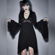 New Without Tags Super Soft And Comfortable Gothic V-neck Dress For Night Out, Alternative Long Sleeve Halloween Dress, Halloween Long Sleeve Mini Dress For Alternative Fashion, Black Gothic Mini Dress With Lace Trim, Black Long Sleeve Punk Dress, Black Witchy Dress For Cosplay, Black Mini Length Dress For Halloween, Black Mini Dress With Lace Trim For Costume Party, Black Gothic Mini Dress For Halloween