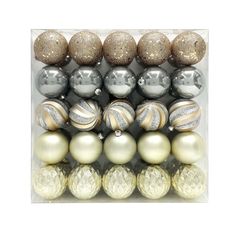 twelve christmas ornaments in a clear box with gold and silver baubles on each ornament