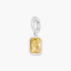 Add a touch of personal charm with the Mackenzie Hinge Birthstone Charm. This playful addition features a convenient hinge closure and customizable birthstone, making it a fun and unique way to express yourself. Available in 14k gold plated sterling silver or rhodium plated sterling silver 1/8"x1/4" charm 5mm Cubic Zirconia NOTE - If you are looking to add or remove the birthstone charm from an existing chain, the hinge will need to be opened. NOTE - Birthstone color may slightly vary per the co Cubic Zirconia Gemstone Huggie Jewelry, Cubic Zirconia Gemstone Huggie Earrings, Minimalist Jewelry With Rectangular Birthstone, Minimalist Rectangular Birthstone Jewelry, Sterling Silver Birthstone Huggie Jewelry, Sterling Silver Huggie Birthstone Jewelry, Modern Jewelry With Rectangular Birthstone, Modern White Gold Jewelry With Birthstone, Minimalist Yellow Sterling Silver Jewelry