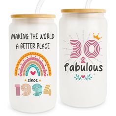 two white mason jars with the words fabulous and fabulous printed on them, one has a rainbow