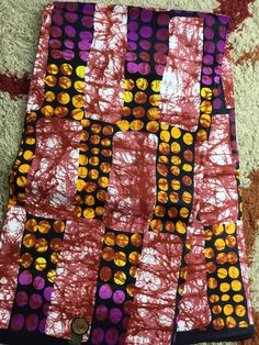 This brown,purple and gold African Fabric is high quality African print made from 100% cotton and it's 45 inches wide. It is used for making African Clothing, African quilts, & For Home decoration. FYI: Print is Double sided. The listing is for 1, 6 yards and Headwrap Each piece of fabric measures:  36in by 45in for 1 yard 216in by 45in for 6 yards 70in by 22in for Head wrap If you purchase more than one yard, you will receive one continuous piece. *If you require more than what I have listed, feel free to send me email. CARE INSTRUCTIONS: *DO NOT BLEACH *Hand wash with cold water and mild soap or Dry clean *Press with hot iron for a crispy look. Color may be different due to your monitor African Quilts, Clean And Press, African Prints, African Print Fabric, Ankara Fabric, African Fabric, Head Wrap, African Clothing, Mild Soap