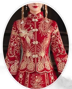 a woman in a red dress with gold embroidery on the chest and long sleeves, wearing earrings