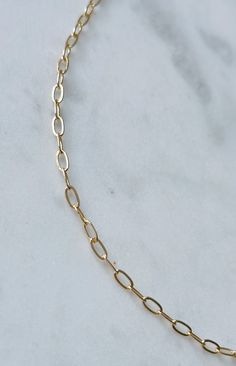 This dainty gold paperclip chain necklace is the perfect everyday accessory and can be effortlessly layered with other necklaces. Necklace is 16 inches long with a 2 inch extender. Elegant Everyday Charm Necklaces With Paperclip Chain, Everyday 14k Gold Filled Paperclip Chain Necklace, Simple Everyday Paperclip Chain Jewelry, Simple Everyday Paperclip Chain Necklace, Chic Paperclip Bracelet With Adjustable Oval Link, Dainty 14k Gold Charm Necklaces With Paperclip Chain, Everyday Charm Necklaces With Paperclip Chain In 14k Gold, Dainty 14k Gold Charm Necklace With Paperclip Chain, Dainty Cable Chain Necklace For Everyday