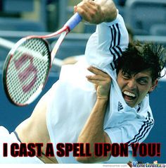 a man holding a tennis racquet on top of a tennis court