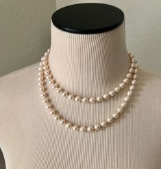 Vintage single strand of pearls is 36 inches in length.. ... but is versatile and can easily be worn as a double strand as seen in the pictures. The pearls are a creamy white hue. The clasp is a shepherd's hook style. Great classic piece of costume jewelry. The pearls are in lovely vintage condition! Vintage Royal Jewelry, 50s Necklace, 1930s Jewelry, Business Fits, Vintage Pearl Jewelry, 60s Jewelry, Alien Halloween, Vintage Pearl Necklace, Pearl Rope