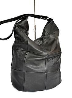 "Leather handbag Black leather purse Leather shouler bag Black leather bag Black shoulder purse Leather hobo bag purse Black leather hobo Slouchy leather bag Black slouchy bag Soft leather bag Women leather bag Leather hobo black This is a comfortable and capacious bag.Its simple and functional character allows you to fit everything you need inside throughout your entire day. It is voluminous yet neat, making it a great addition to a loose fitting and elegant clothing. This leather bag women is Capacious Bag, Black Shoulder Purse, Slouchy Hobo Bag, Frye Bags, Elegant Clothing, Large Leather Bag, Slouchy Bag, Denim Handbags, Soft Leather Bag