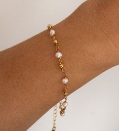 Gold Plated and Freshwater Pearl Beaded Chain Bracelet Real Freshwater Pearls Length: approx. 6 - 8 inches (adjustable) 18 Gold Electroplated This bracelet is made with a real freshwater pearls, therefore each pearl is unique and no two bracelet are alike. Adjustable Gold Bracelet With Pearl Charm, Adjustable Gold Pearl Bracelet With Pearl Charm, Adjustable Gold Pearl Chain Bracelet, Minimalist Adjustable Beaded Bracelets With Pearl Chain, Minimalist Adjustable Beaded Bracelet With Pearl Chain, Adjustable Pearl White Bracelets With Pearl Chain, White Pearl Bracelets With Adjustable Chain, Adjustable Gold Bracelet With Pearl Drop, Adjustable Chain Bracelet With Pearl Drop