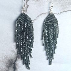 These earrings are 4" long and 1" wide Materials:  - Earring wire is 21g Electroplated Brass - Nickel-Free - Beads are semi-transparent glass beads with a sparkly center. Note: This is a hand-crafted item and each has it's own unique charm. Elegant Silver Beaded Chain Earrings, Silver Beaded Chain Earrings, Silver Beaded Earrings For Evening, Party Beaded Earrings With Silver Round Beads, Party Beaded Chain Dangle Earrings, Silver Beaded Drop Earrings For Party, Silver Beaded Chain Earrings For Party, Silver Earrings With Beaded Chain For Party, Elegant Beaded Chain Earrings For Party